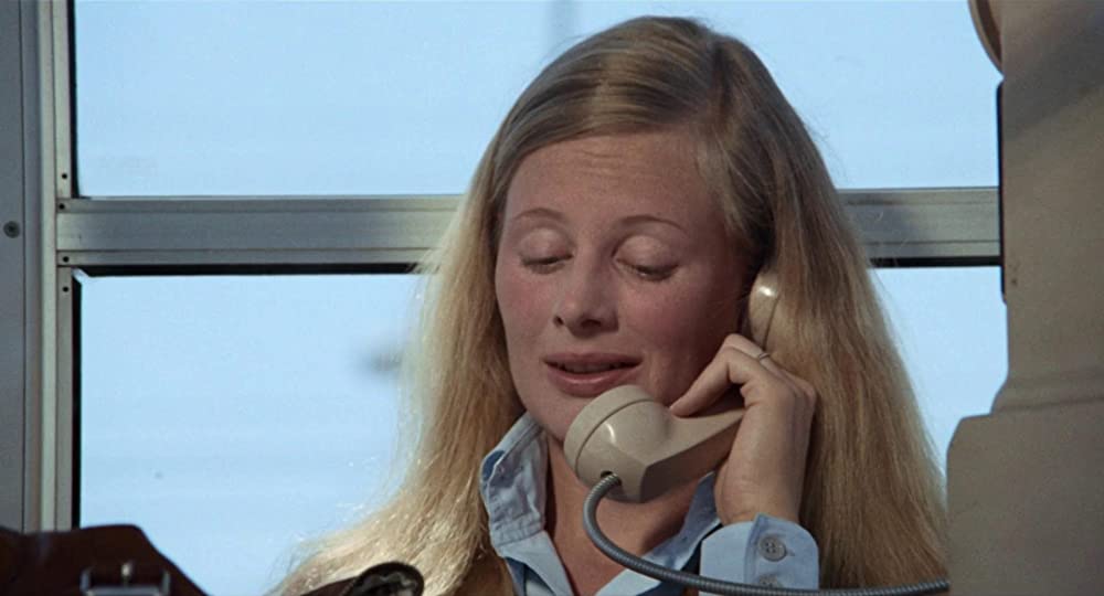 雨のなかの女の画像