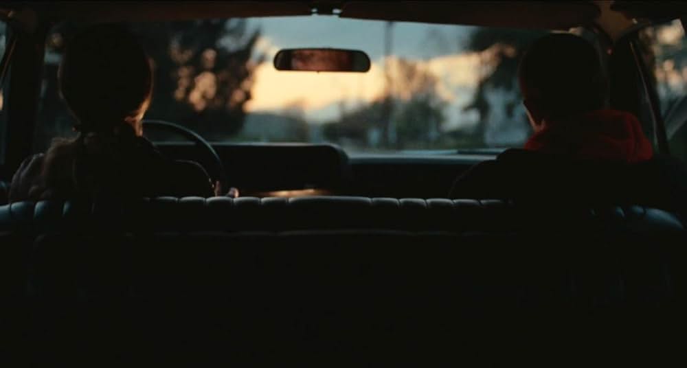 雨のなかの女の画像