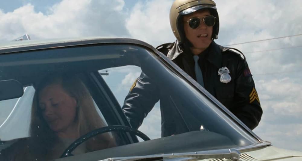 雨のなかの女の画像