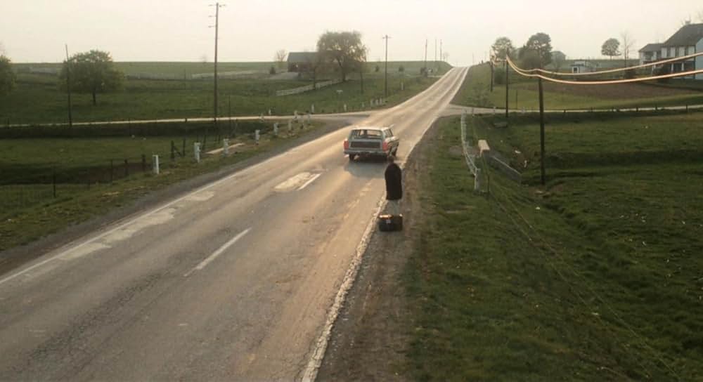 雨のなかの女の画像