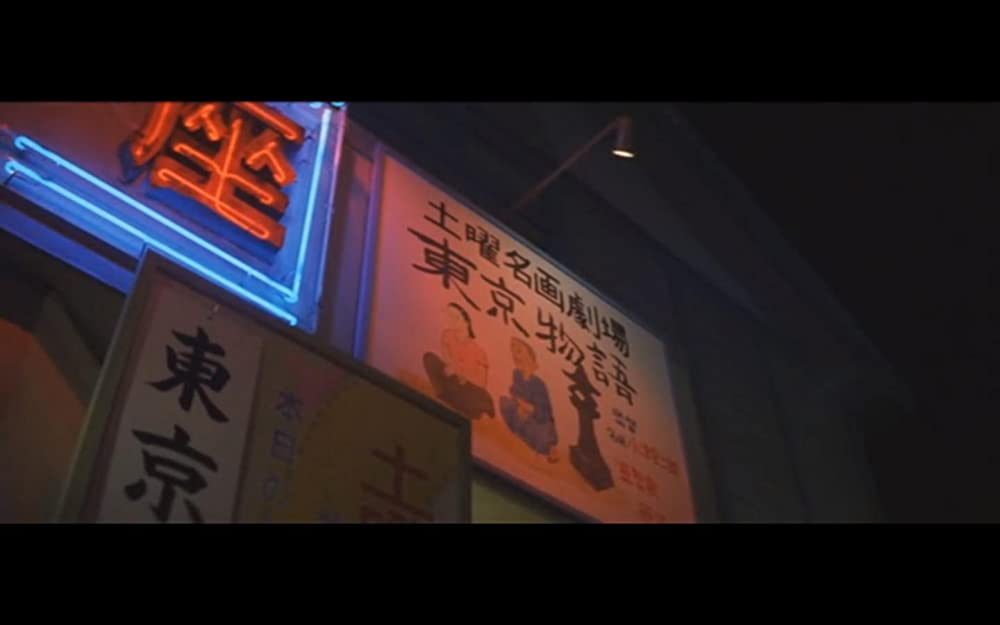 虹をつかむ男の画像