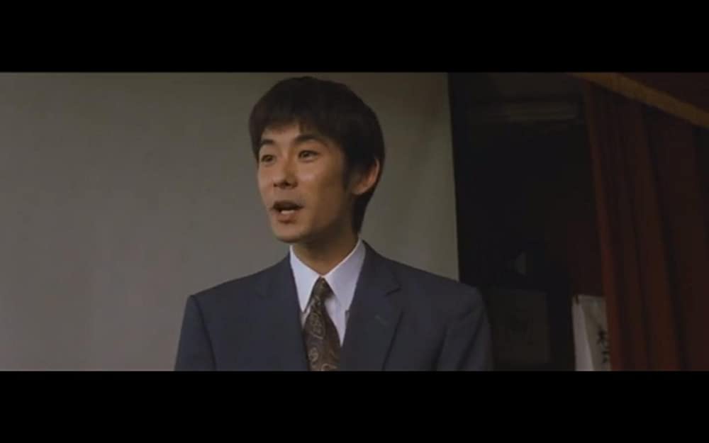 虹をつかむ男の画像