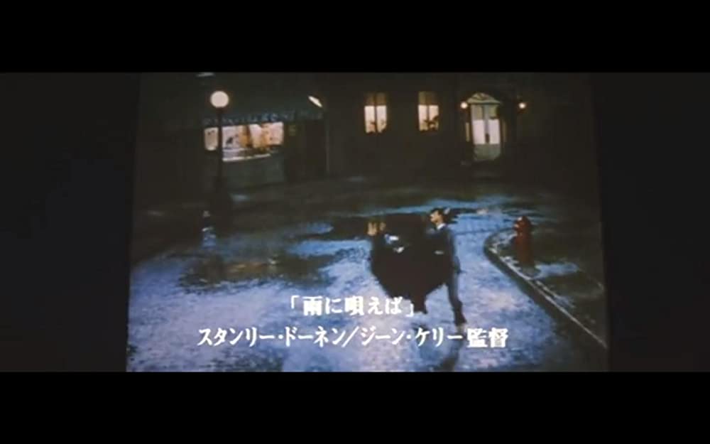 虹をつかむ男の画像