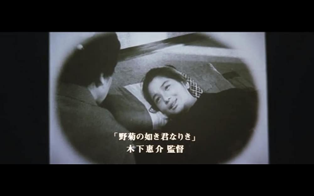 虹をつかむ男の画像