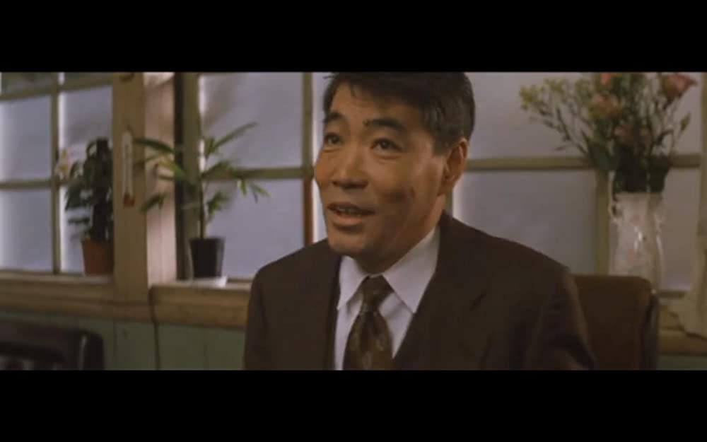 虹をつかむ男の画像