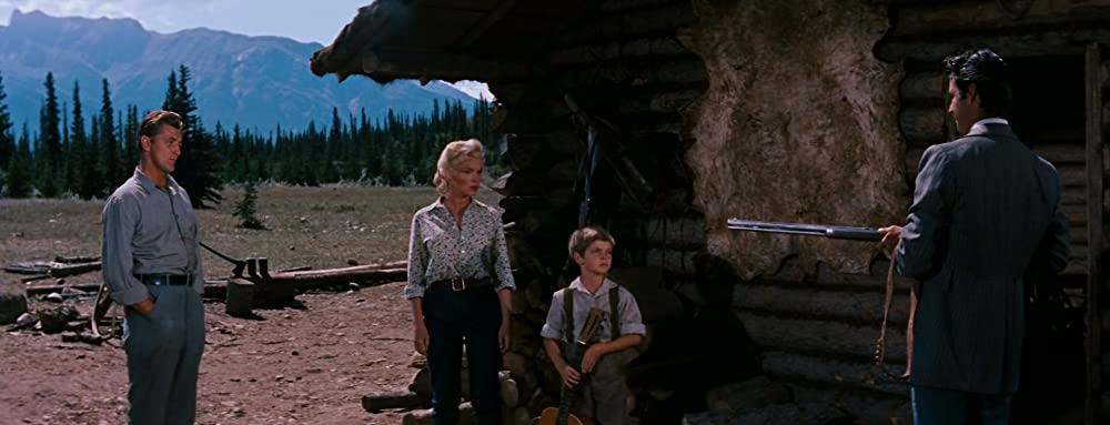 「帰らざる河」ロバート・ミッチャム & マリリン・モンロー & ロリー・カルホーン & トミー・レティグの画像