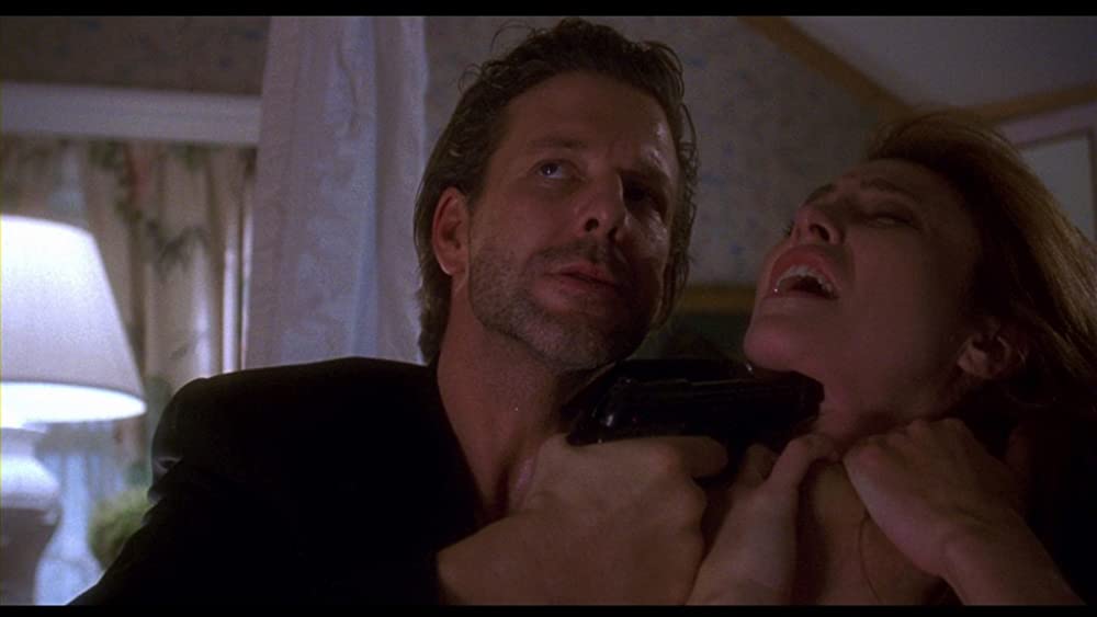 「逃亡者」ミミ・ロジャース & ミッキー・ロークの画像