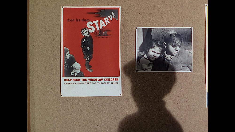 緑色の髪の少年の画像