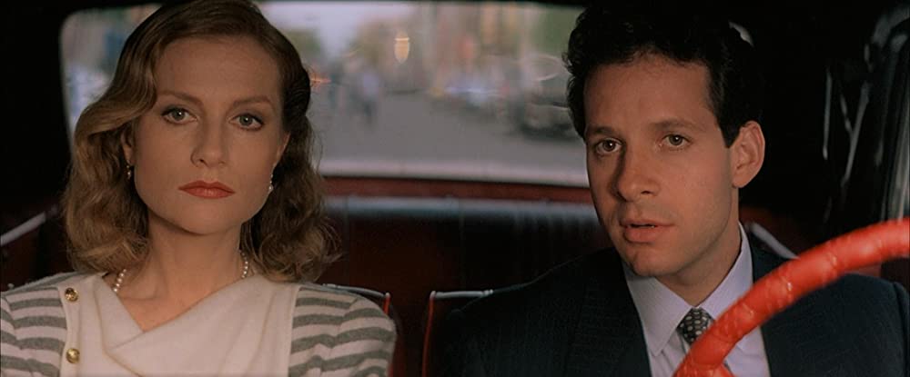 「窓・ベッドルームの女」スティーブ・グッテンバーグ & イザベル・ユペールの画像