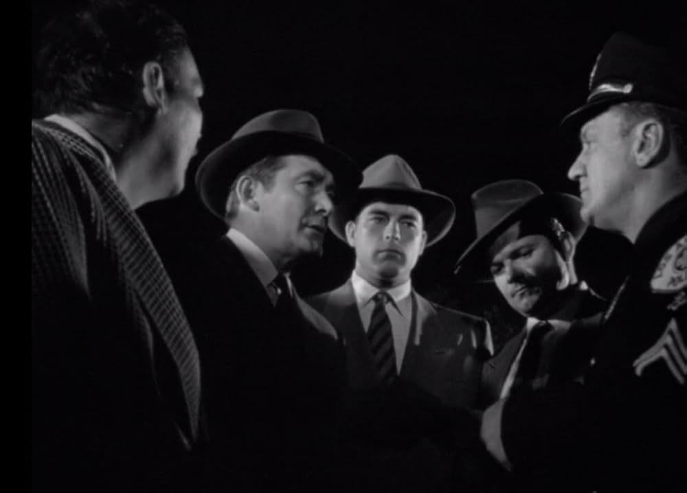 夜歩く男の画像