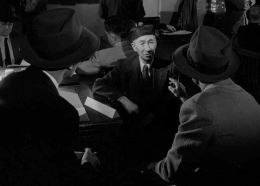 夜歩く男の画像