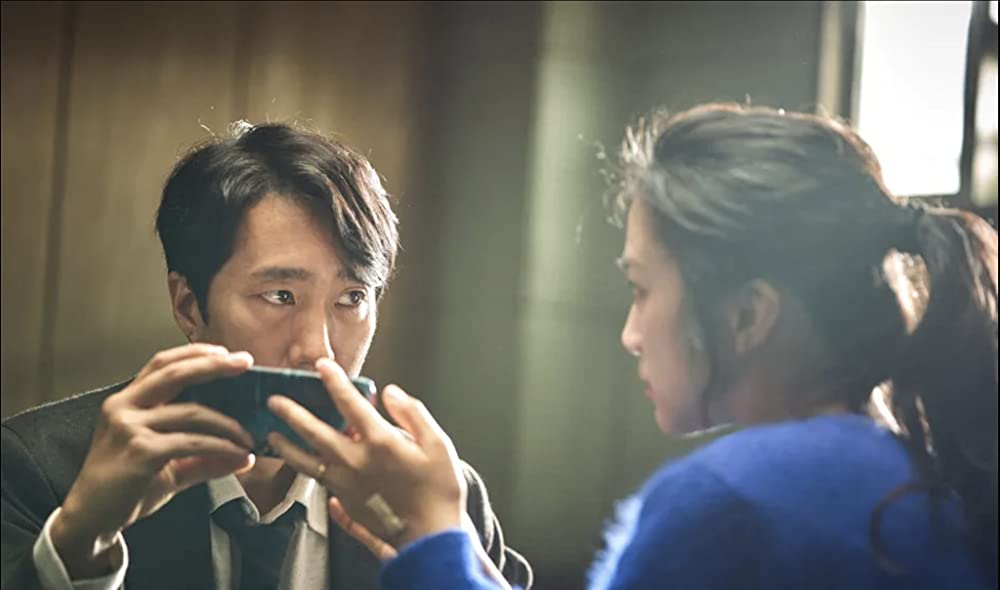 「別れる決心」朴海日 & タン・ウェイの画像