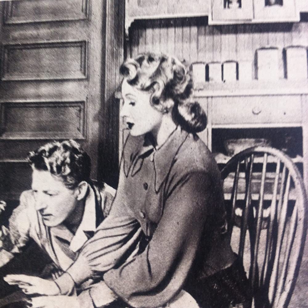 虹を掴む男の画像