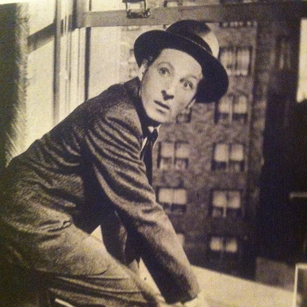 虹を掴む男の画像