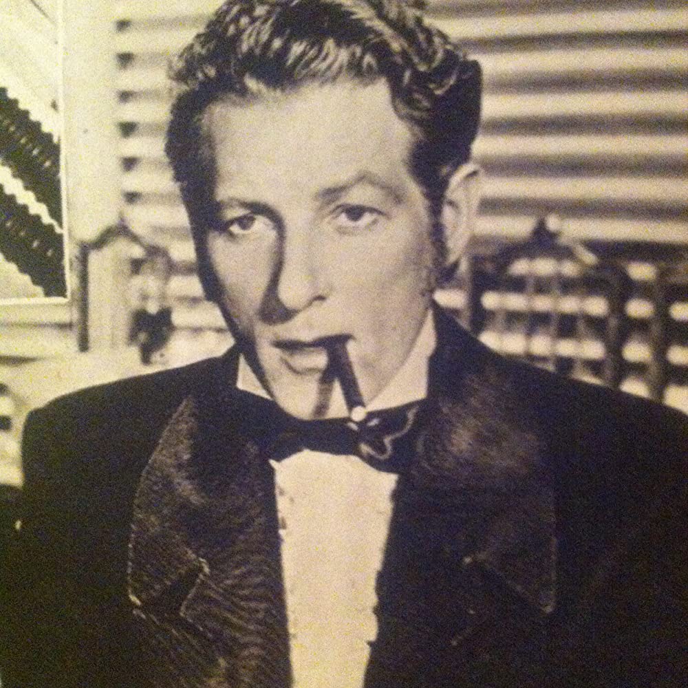 虹を掴む男の画像