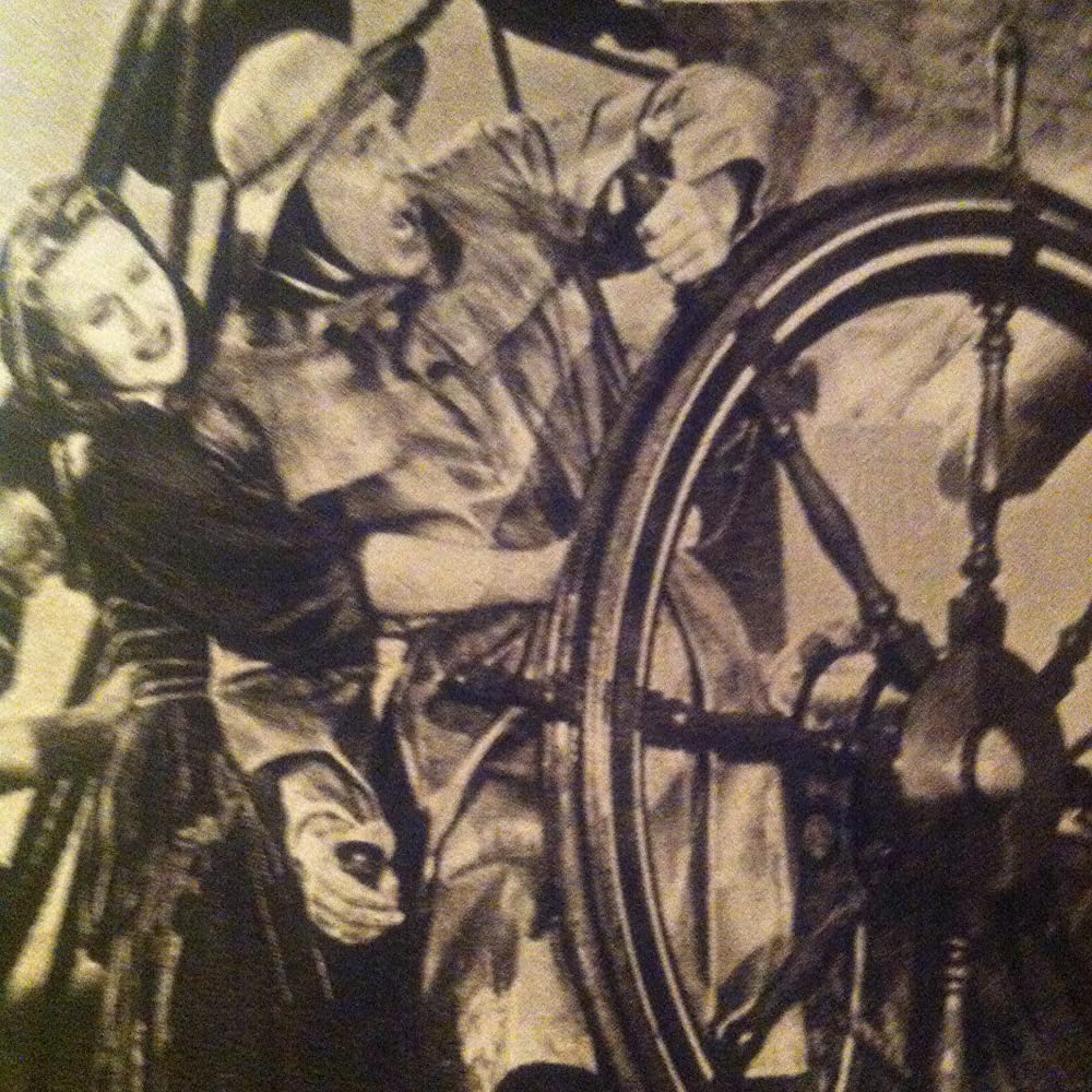 虹を掴む男の画像