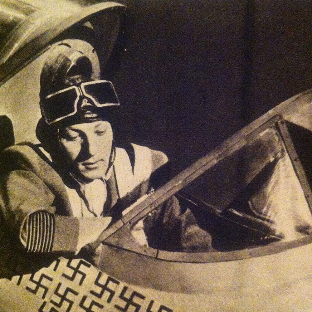 虹を掴む男の画像