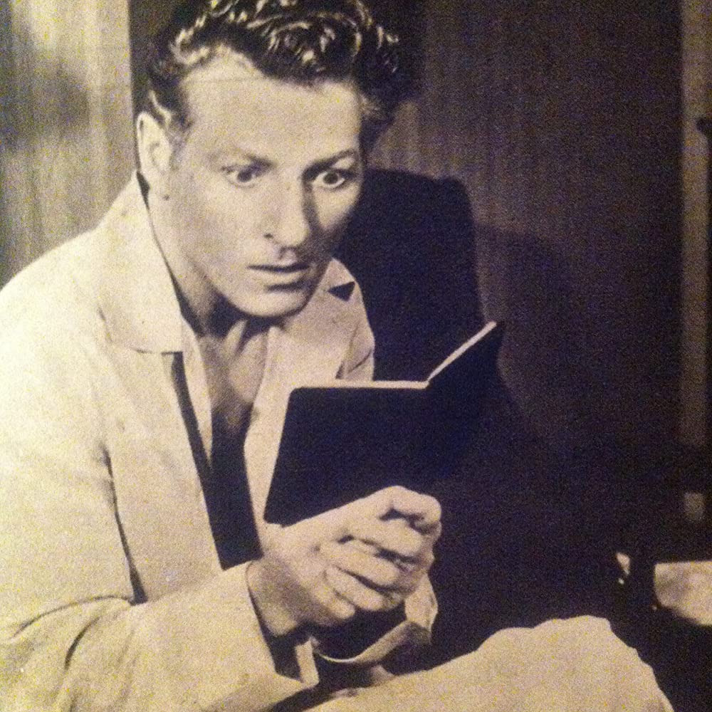 虹を掴む男の画像