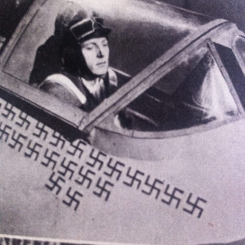 虹を掴む男の画像