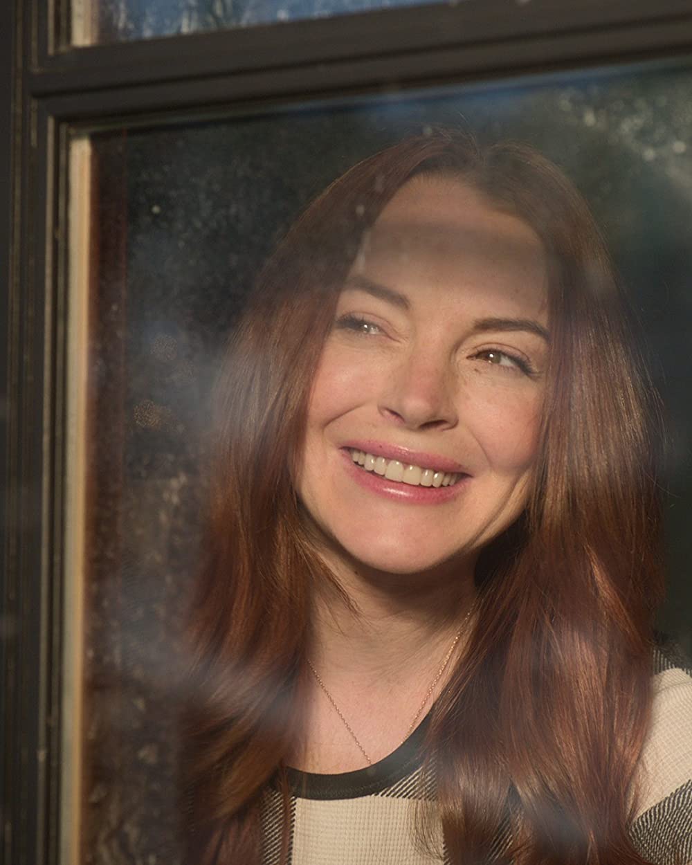 「フォーリング・フォー・クリスマス」リンジー・ローハンの画像