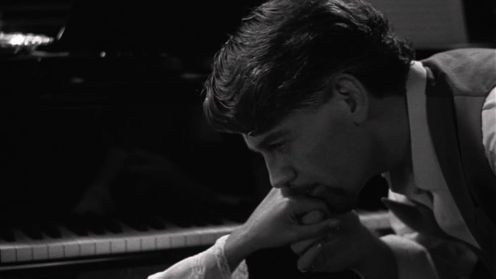 愛と死の間での画像