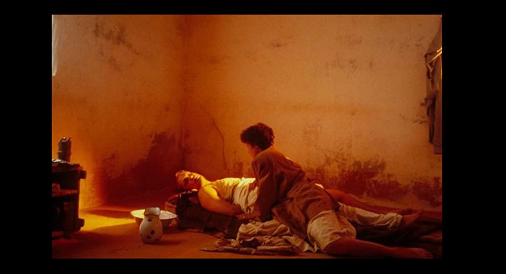 「シェルタリング・スカイ」ジョン・マルコビッチ & デブラ・ウィンガーの画像