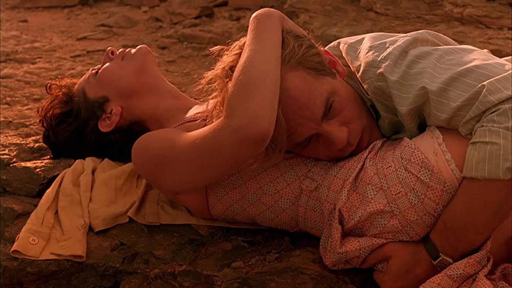 「シェルタリング・スカイ」ジョン・マルコビッチ & デブラ・ウィンガーの画像