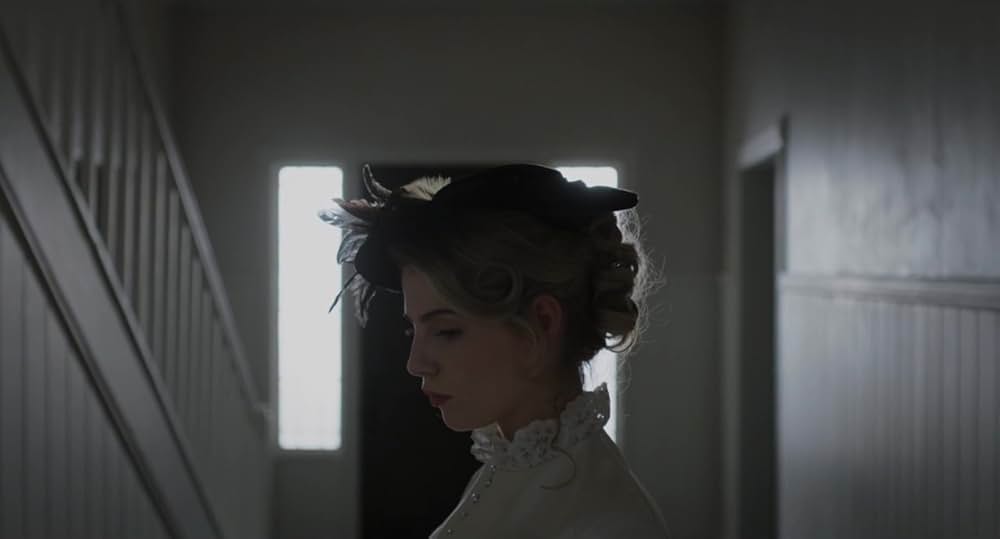 呪われし家に咲く一輪の花の画像