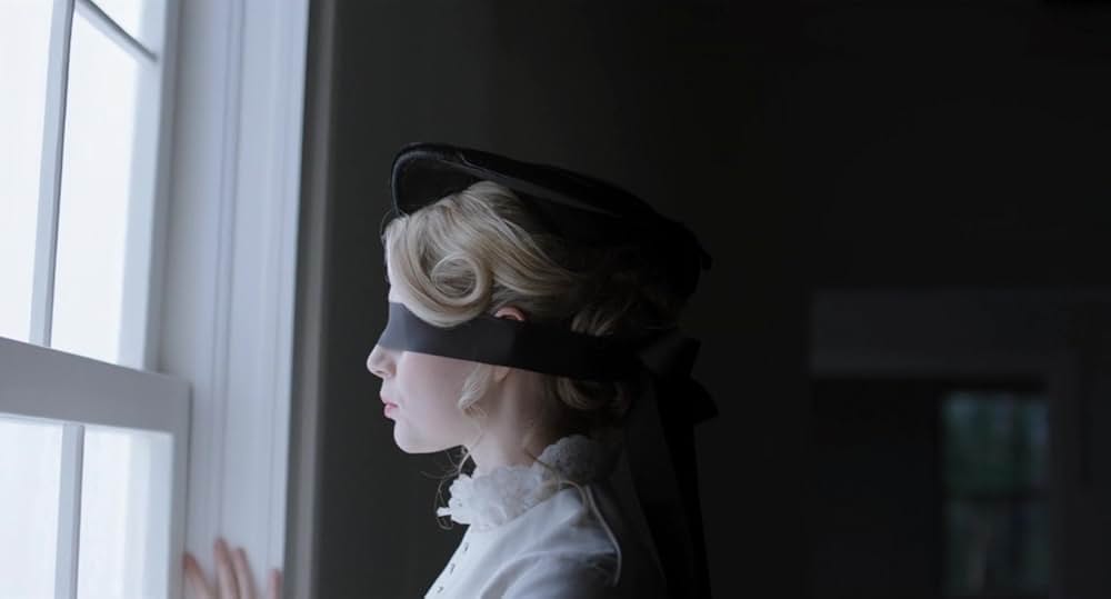 呪われし家に咲く一輪の花の画像