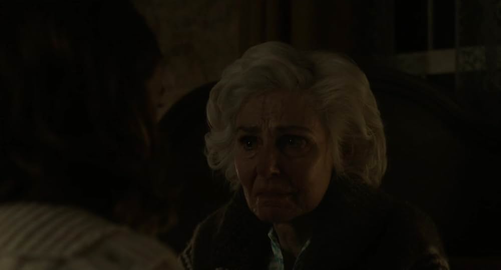 呪われし家に咲く一輪の花の画像