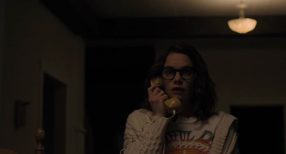 呪われし家に咲く一輪の花の画像