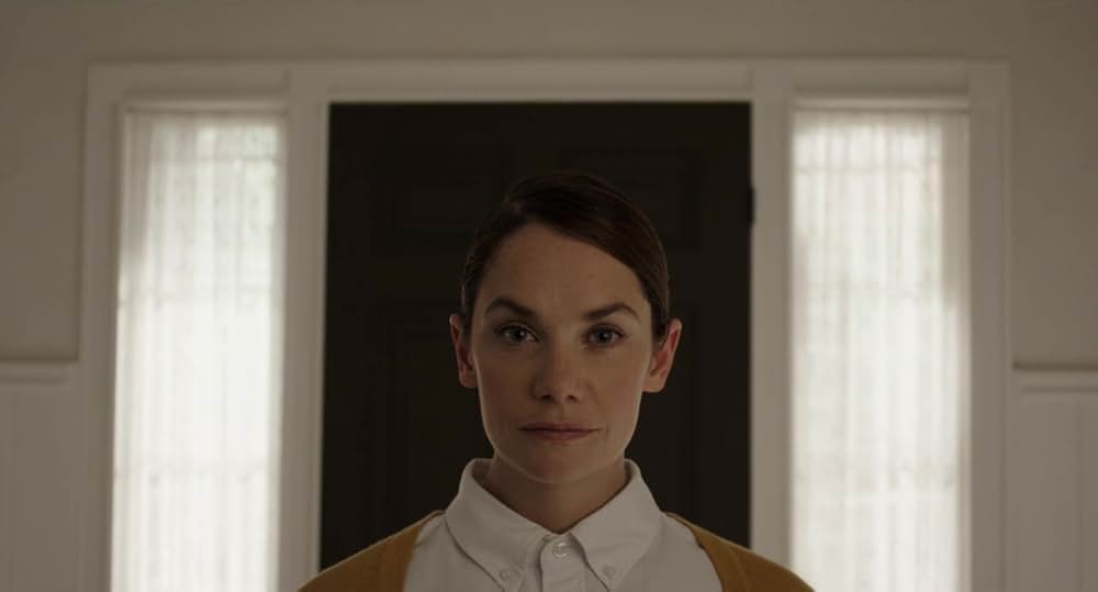 呪われし家に咲く一輪の花の画像