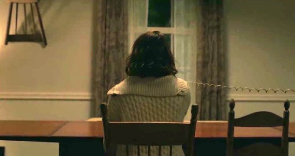 呪われし家に咲く一輪の花の画像