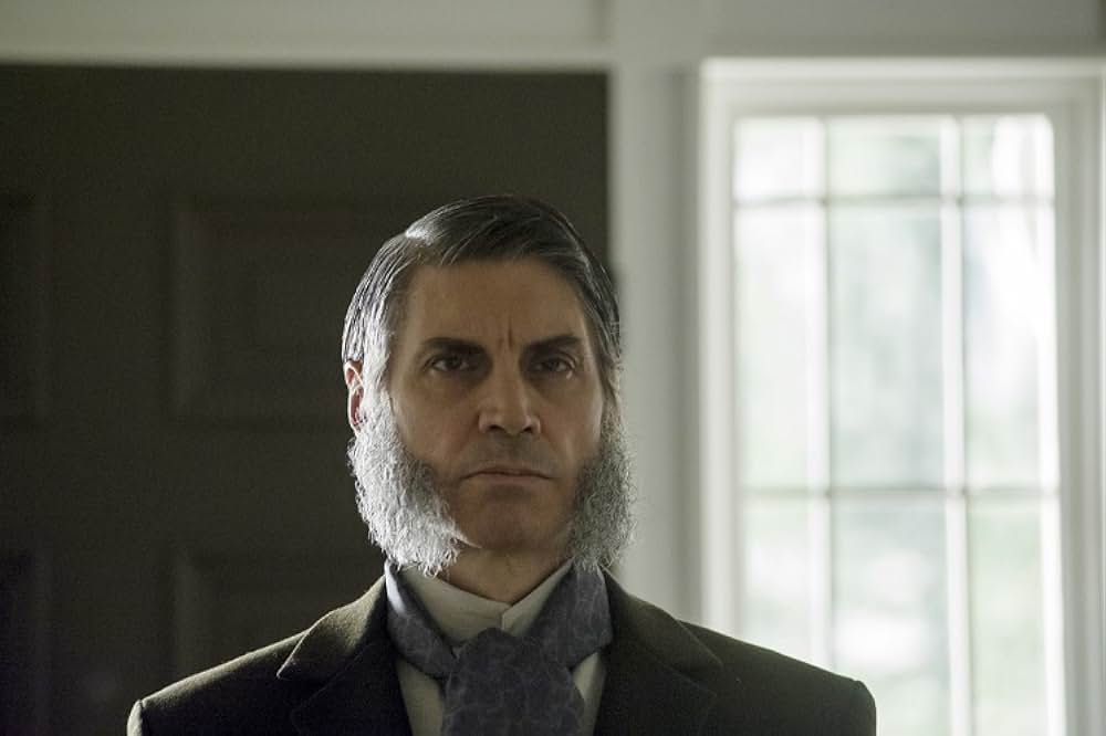 呪われし家に咲く一輪の花の画像