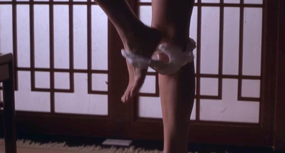 レッド・コーナー 北京のふたりの画像