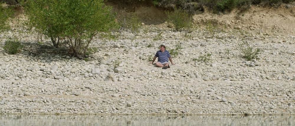 湖の見知らぬ男の画像