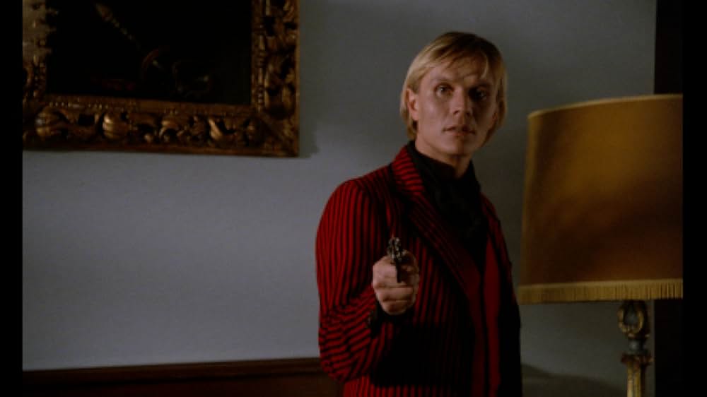 美女のうごめき／鮮血に染まる死霊の館の画像