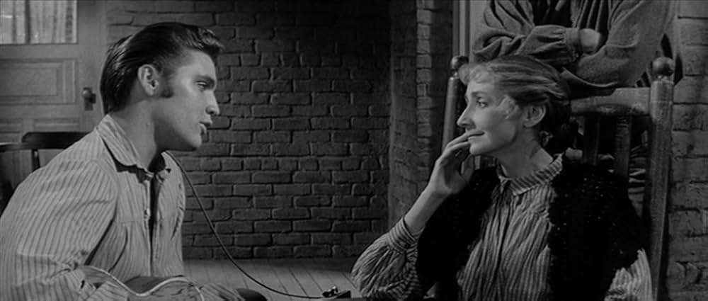 やさしく愛しての画像