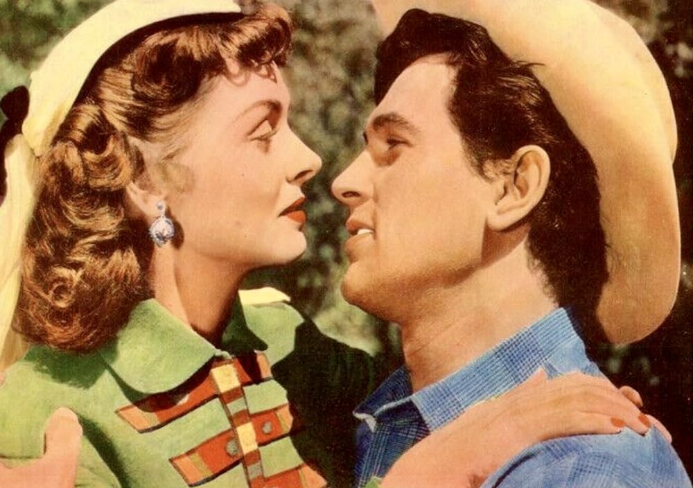 「限りなき追跡」ロック・ハドソン & ドナ・リードの画像