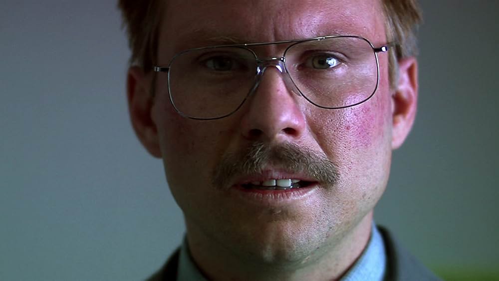 その男は、静かな隣人の画像