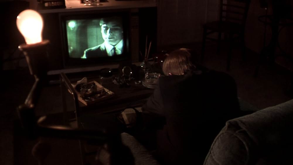 その男は、静かな隣人の画像