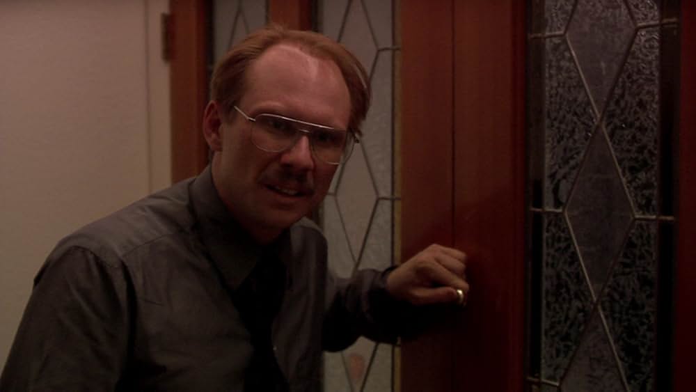 その男は、静かな隣人の画像