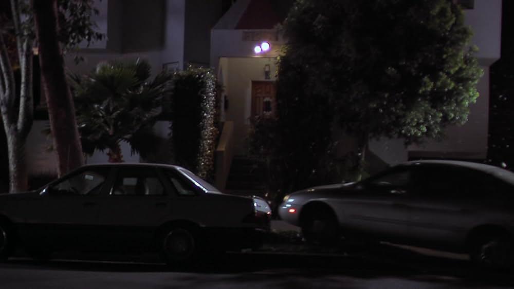 その男は、静かな隣人の画像