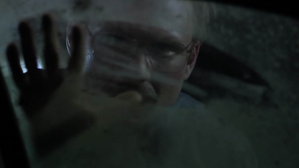 その男は、静かな隣人の画像