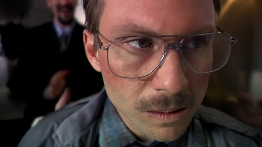 その男は、静かな隣人の画像