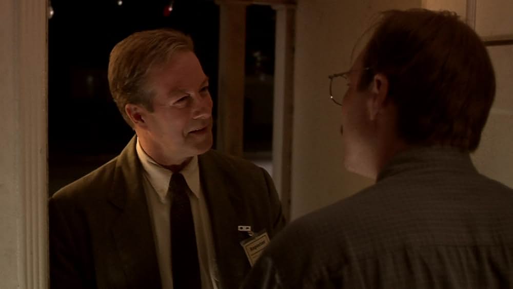 その男は、静かな隣人の画像