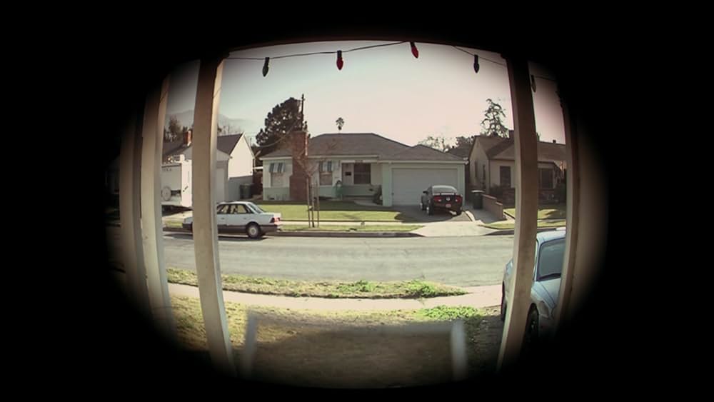 その男は、静かな隣人の画像