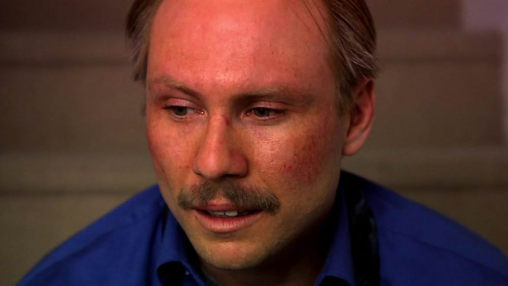 その男は、静かな隣人の画像