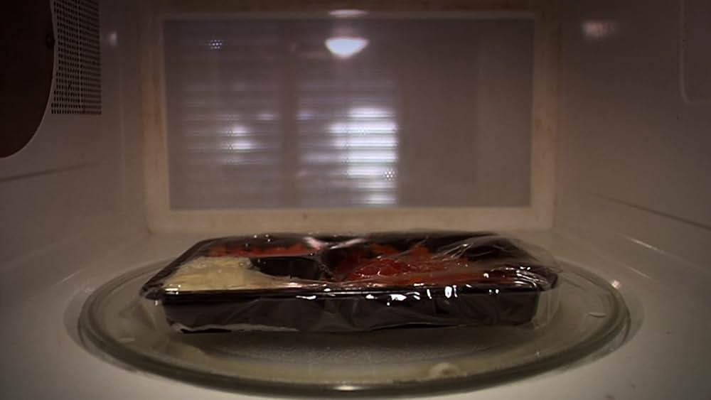 その男は、静かな隣人の画像