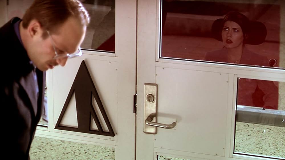 その男は、静かな隣人の画像